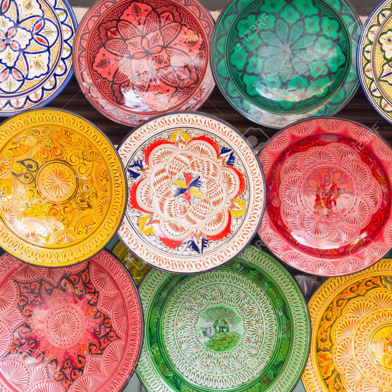 https://previews.123rf.com/images/kasto/kasto1402/kasto140200033/25987982-traditional-arabic-handcrafted-colorful-decorated-plates-shot-at-the-market-in-marrakesh-morocco-afr.jpg
